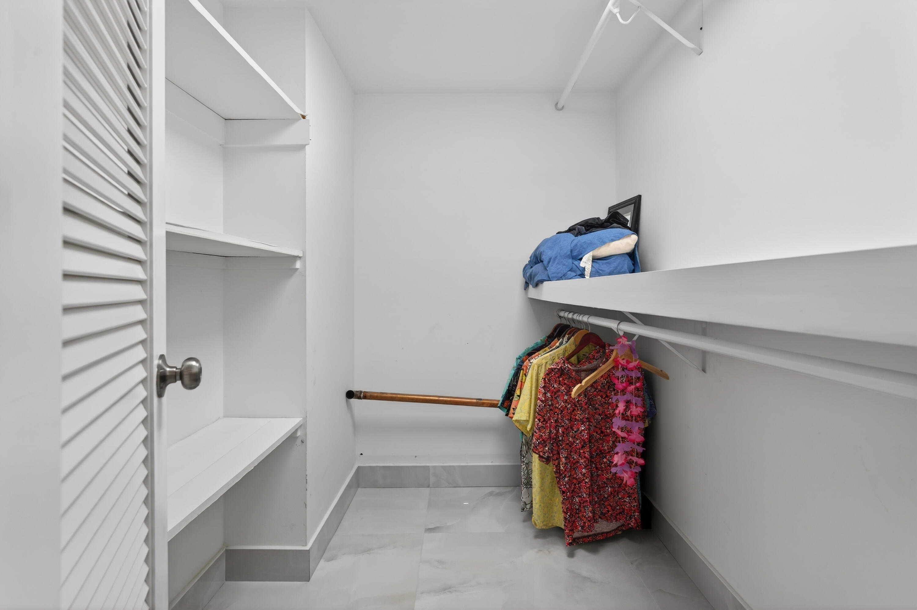 2134 Northeast 36th Street, Unit 82 Lighthouse Point, FL 33064 - Photo 23 of 38 a view of walk in closet