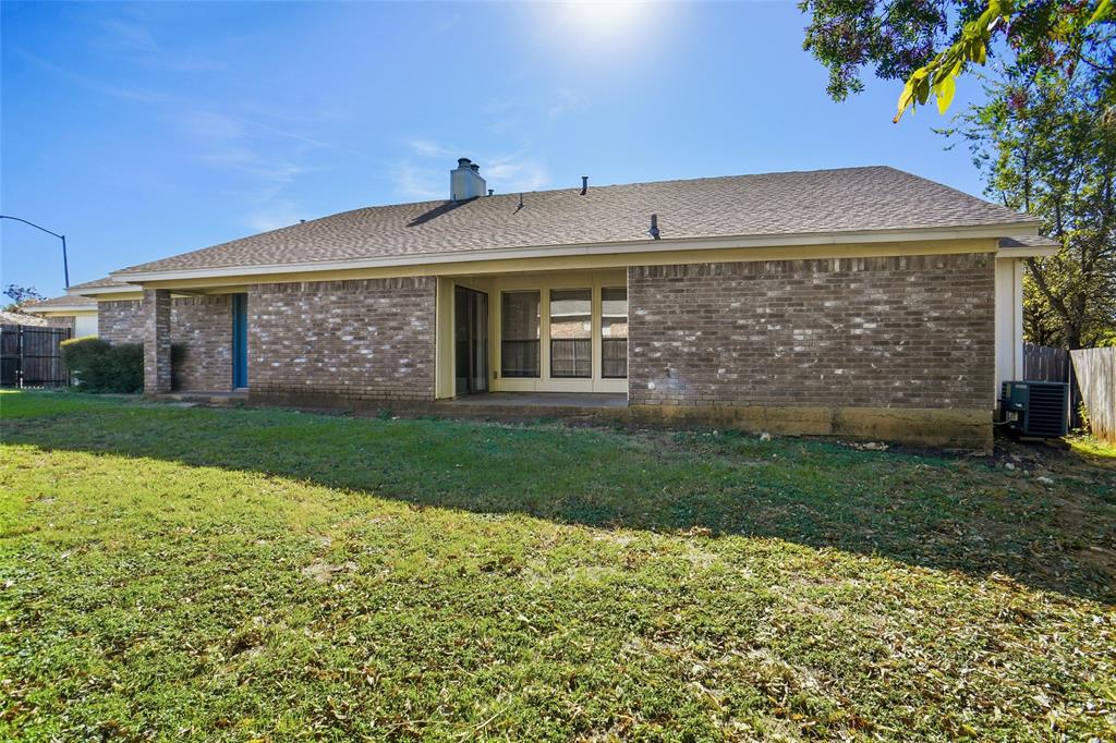 6720 Crestmont Court Fort Worth, TX 76133 - Photo 16 of 16 a view of a house with a yard