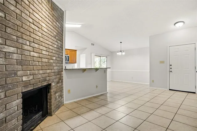 a view of livingroom with hardwood floor and fireplace