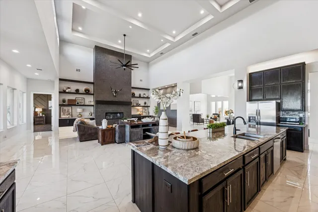 a kitchen with counter top space cabinets and stainless steel appliances