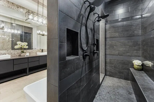 a bathroom with a sink and mirror