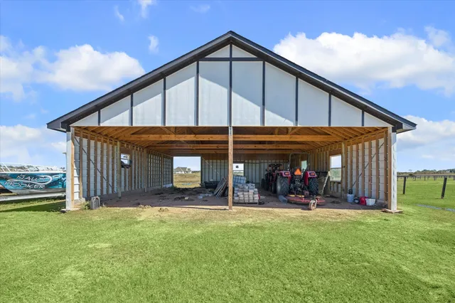a view of a back yard of the house