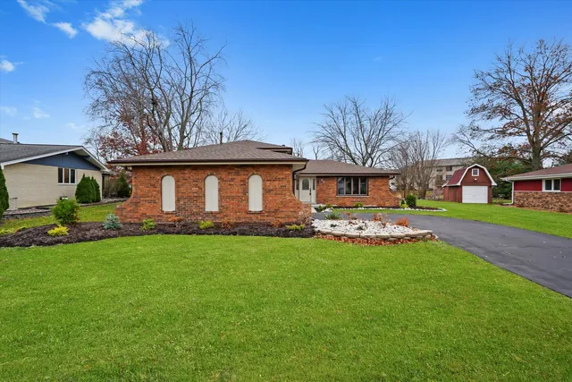 a view of house with garden