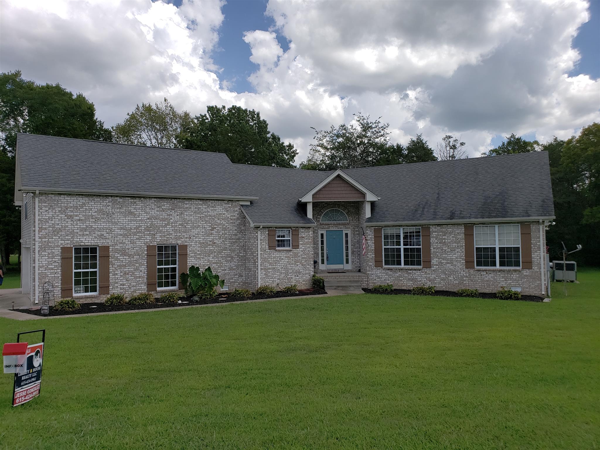 582 Windy Road Mount Juliet, TN 37122 - Photo 1 of 10 a front view of house with yard and green space