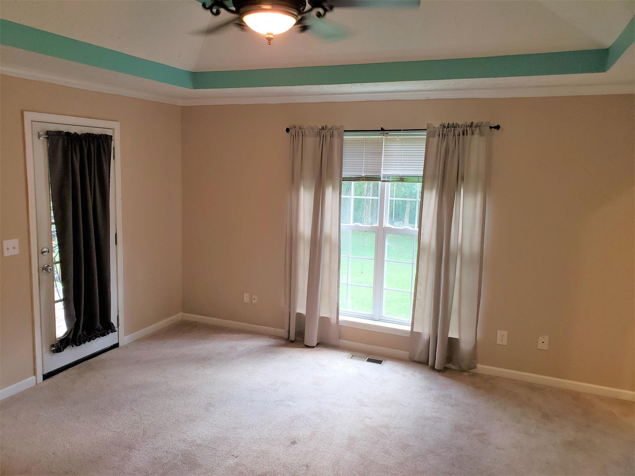 582 Windy Road Mount Juliet, TN 37122 - Photo 6 of 10 a view of an empty room with a window