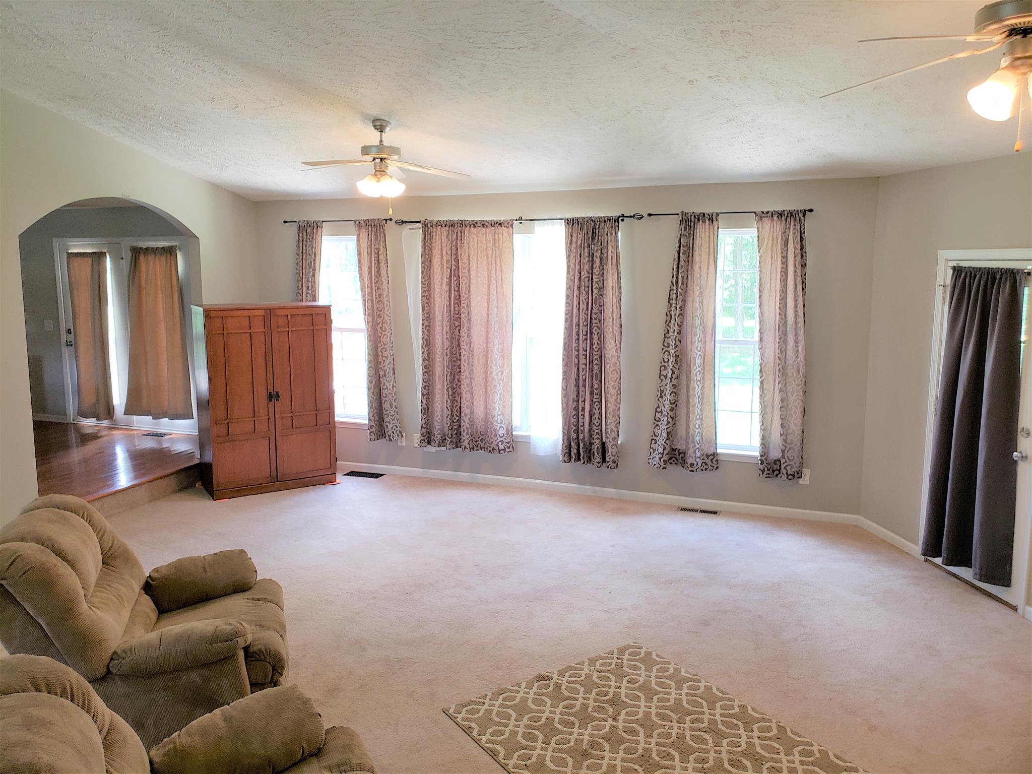 582 Windy Road Mount Juliet, TN 37122 - Photo 8 of 10 a living room with furniture and a window