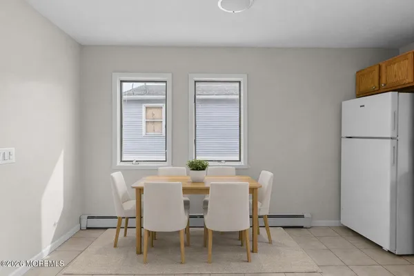 a bathroom with a shower and a toilet