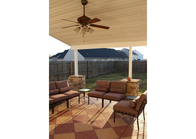 1606 Harrison Way Spring Hill, TN 37174 - Photo 13 of 18 Covered back patio has stained flooor
