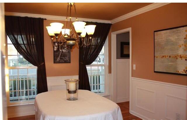 1606 Harrison Way Spring Hill, TN 37174 - Photo 4 of 18 Formal Dining Room faces front and has chair railing