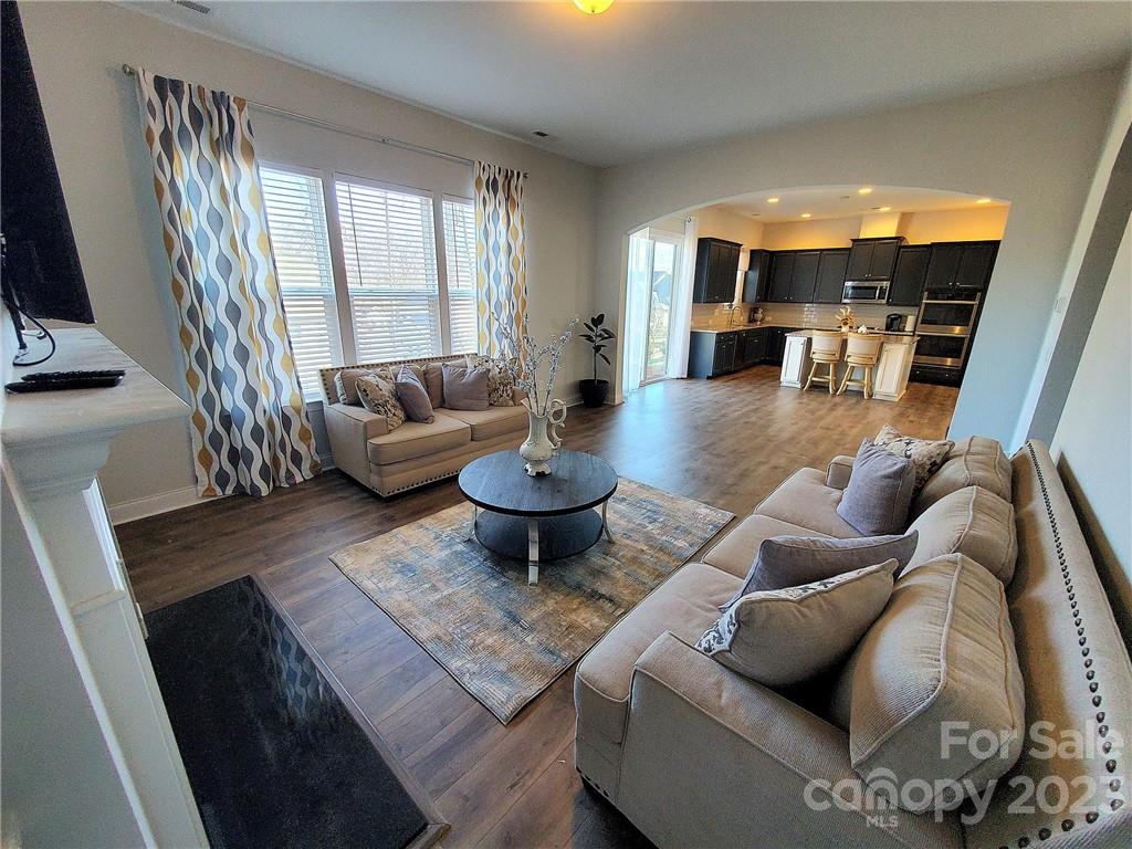 10013 Sunset Ridge Midland, NC 28107 - Photo 18 of 45 a living room with furniture and a large window