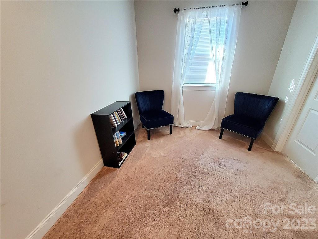 10013 Sunset Ridge Midland, NC 28107 - Photo 30 of 45 a living room with furniture and a window