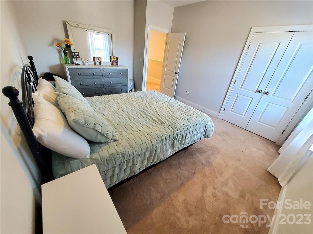 10013 Sunset Ridge Midland, NC 28107 - Photo 33 of 45 a living room with furniture and a rug