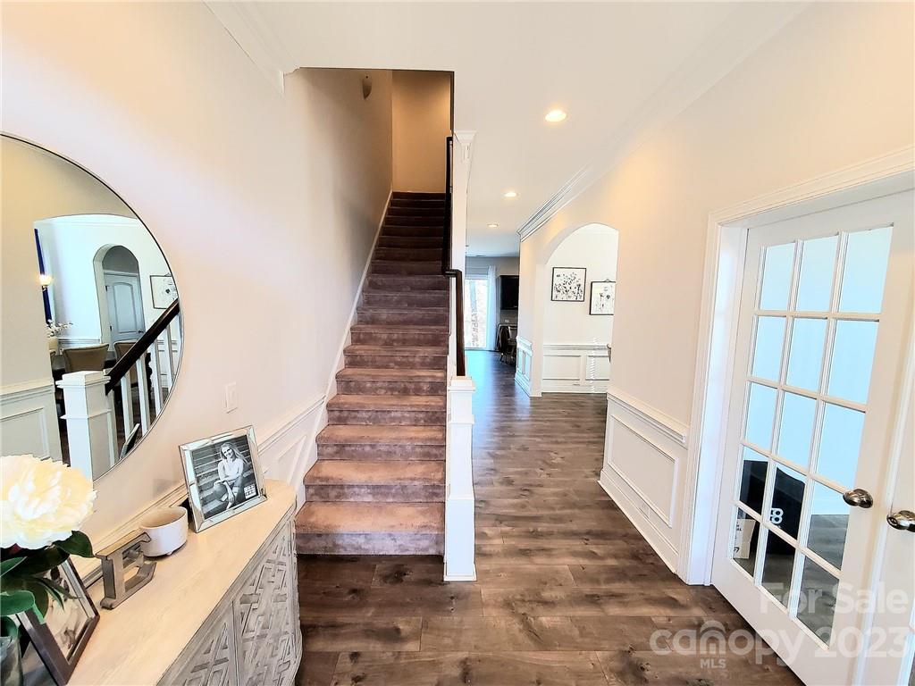 10013 Sunset Ridge Midland, NC 28107 - Photo 4 of 45 a view of entryway and hall with wooden floor