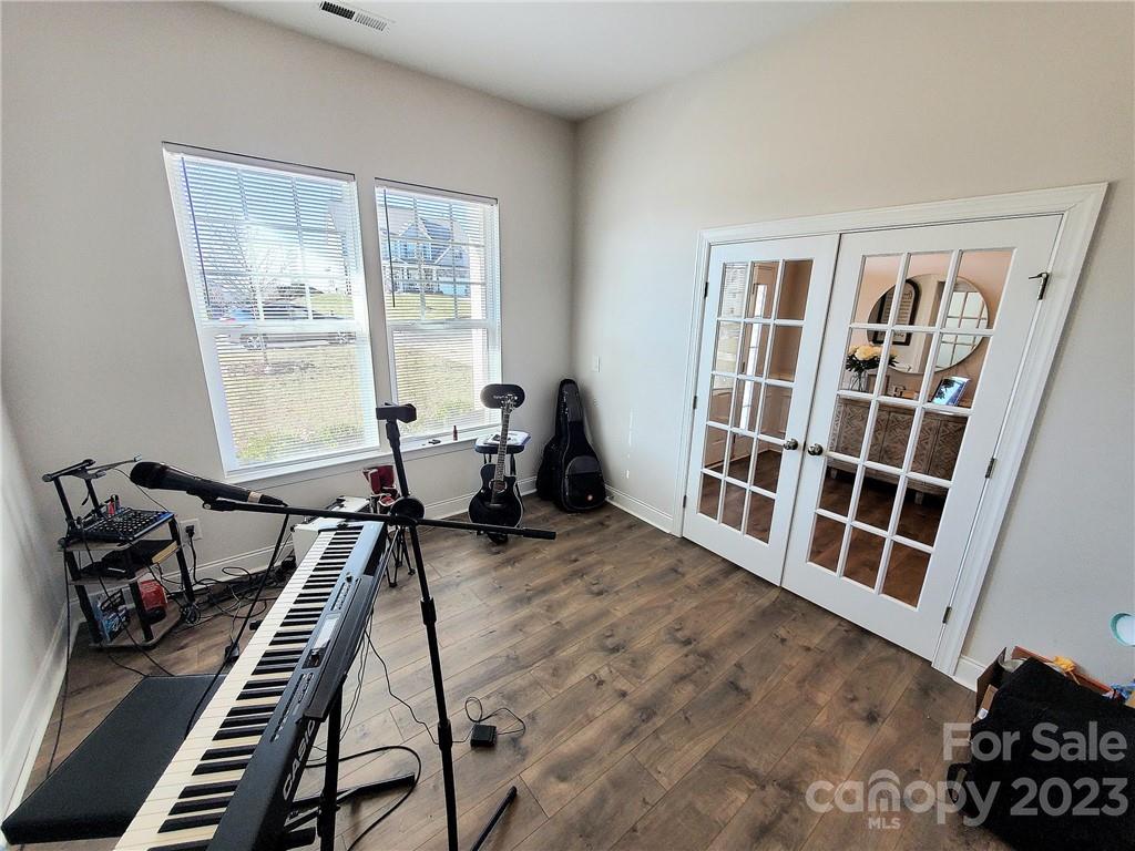 10013 Sunset Ridge Midland, NC 28107 - Photo 7 of 45 a living room with furniture and a window