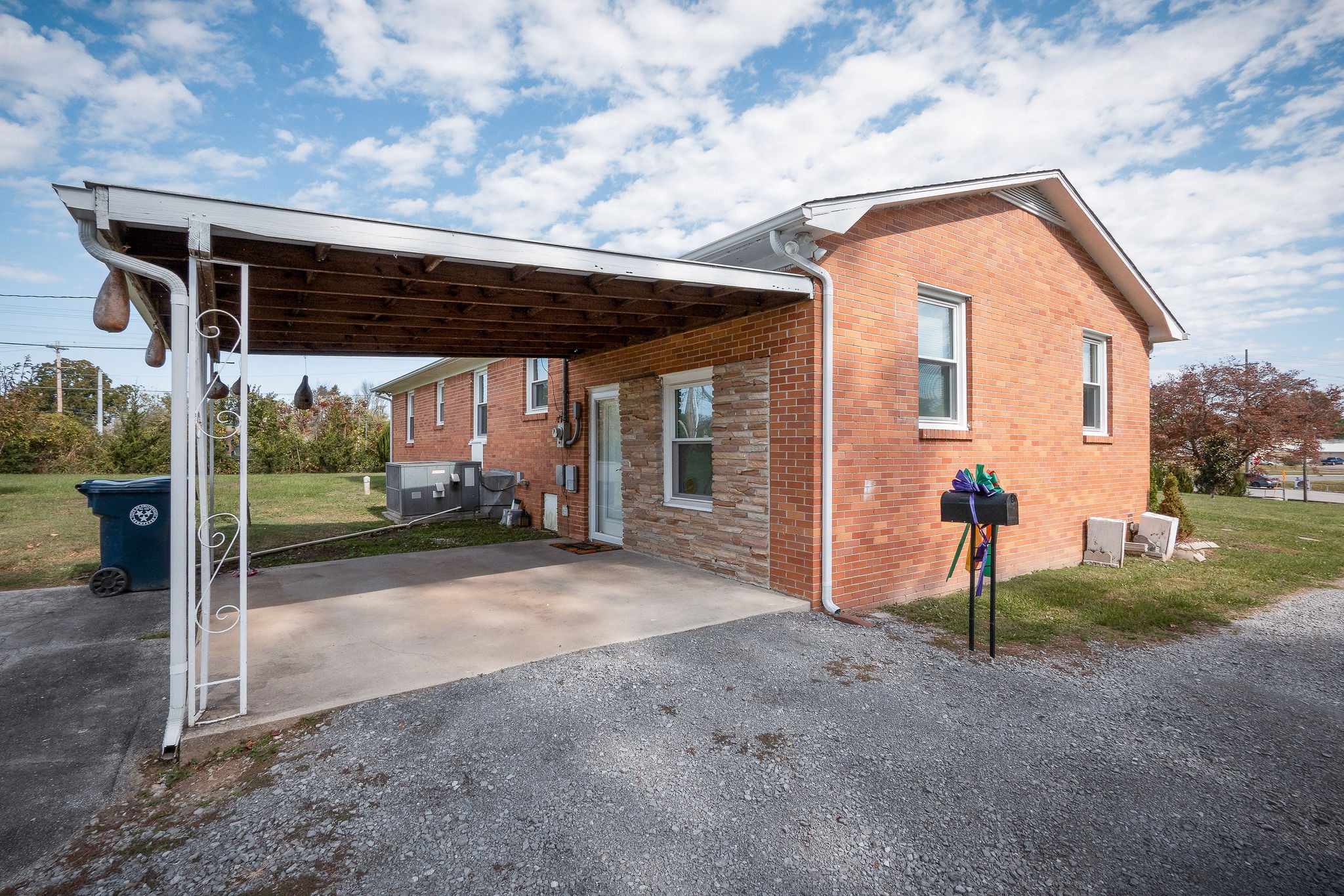 401 Whaley Street Smithville, TN 37166 - Photo 35 of 38 a view of a house with backyard and a tree