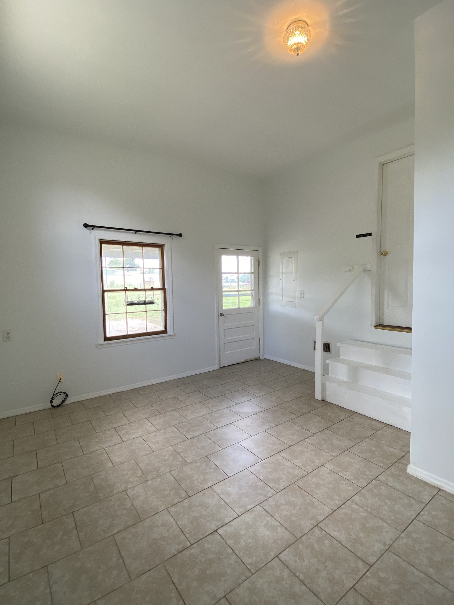 401 Whaley Street Smithville, TN 37166 - Photo 10 of 38 a view of an empty room with a window