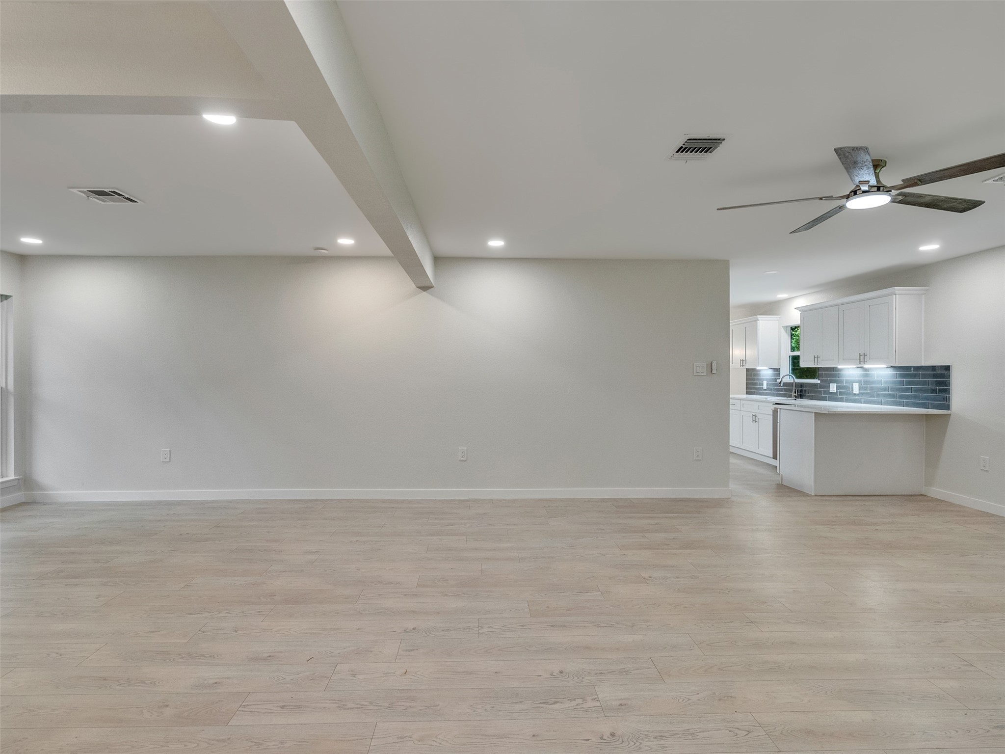 10315 Winding Trail Road La Porte, TX 77571 - Photo 5 of 24 Experience the perfect blend of modern elegance and functionality as you step into your newly remodeled kitchen, seamlessly integrated into an inviting open space.