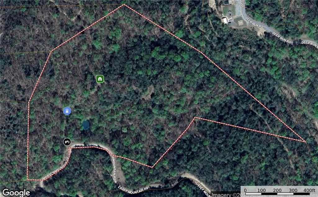 Aerial showing gate, well, pond, and shed