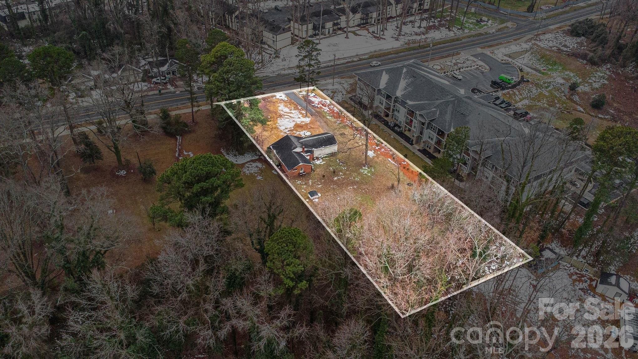 500 Tom Hunter Road Charlotte, NC 28213 - Photo 22 of 24 a view of swimming pool with a yard