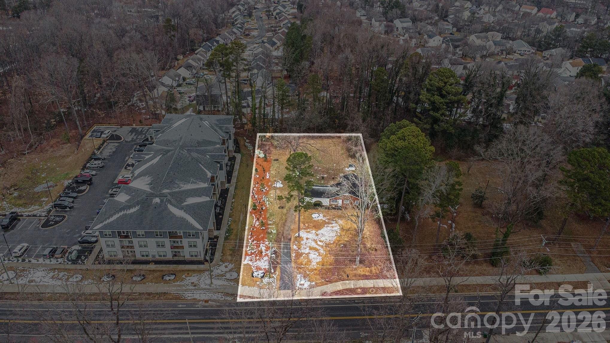 500 Tom Hunter Road Charlotte, NC 28213 - Photo 24 of 24 a stone house with trees in front of it