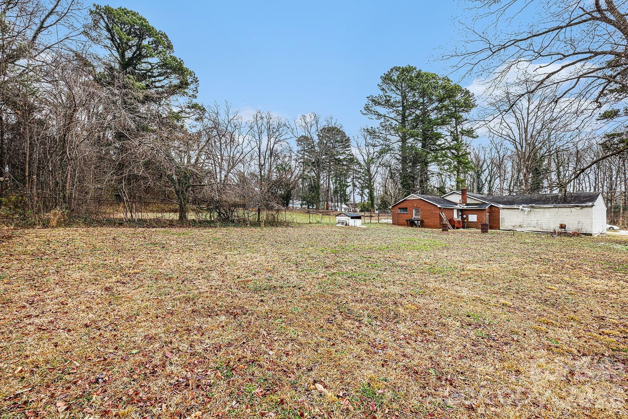 500 Tom Hunter Road Charlotte, NC 28213 - Photo 5 of 24 a view of outdoor space with trees