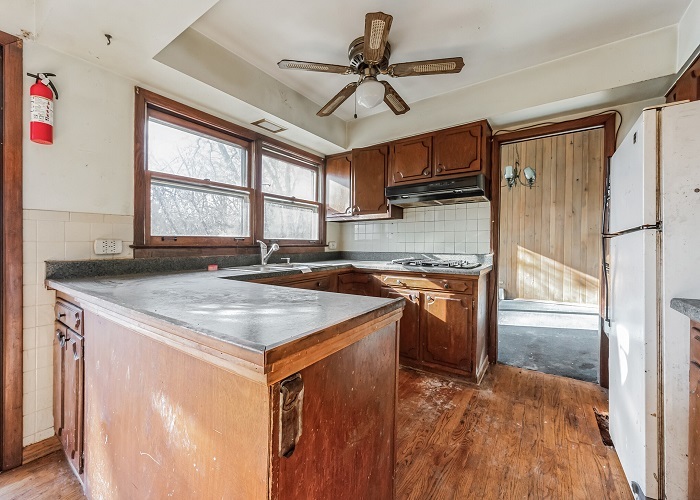 1001 Oak Lane Algonquin, IL 60102 - Photo 14 of 26 a kitchen with stainless steel appliances granite countertop a sink stove and refrigerator