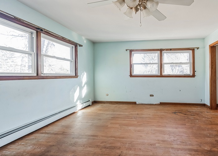 1001 Oak Lane Algonquin, IL 60102 - Photo 20 of 26 an empty room with wooden floor and windows