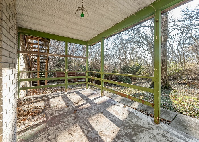 1001 Oak Lane Algonquin, IL 60102 - Photo 5 of 26 a view of a porch with wooden floor and stairs