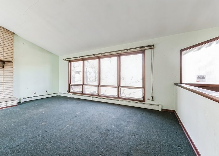 1001 Oak Lane Algonquin, IL 60102 - Photo 8 of 26 an empty room with a fireplace