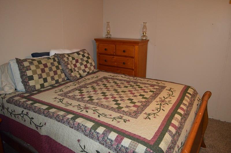 1234 Paynes Church Road Winchester, TN 37398 - Photo 14 of 27 a bedroom with a bed and a dresser