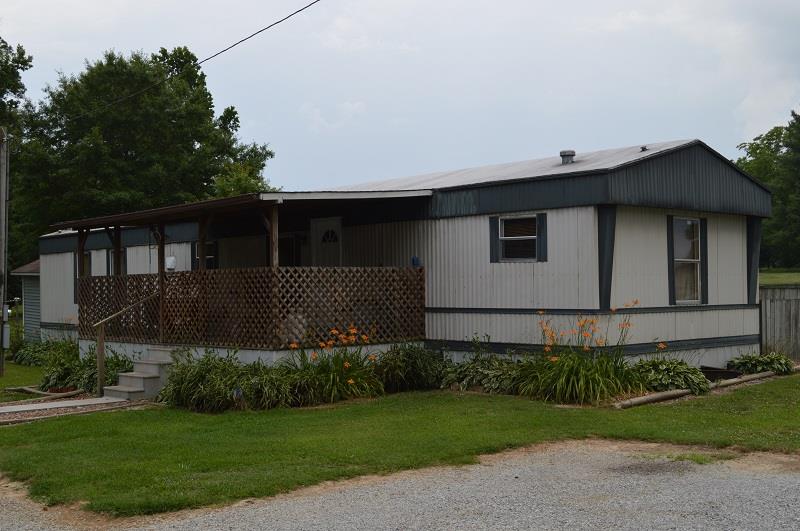 1234 Paynes Church Road Winchester, TN 37398 - Photo 3 of 27 a front view of a house with garden