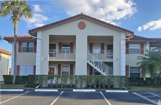 a front view of a house with yard