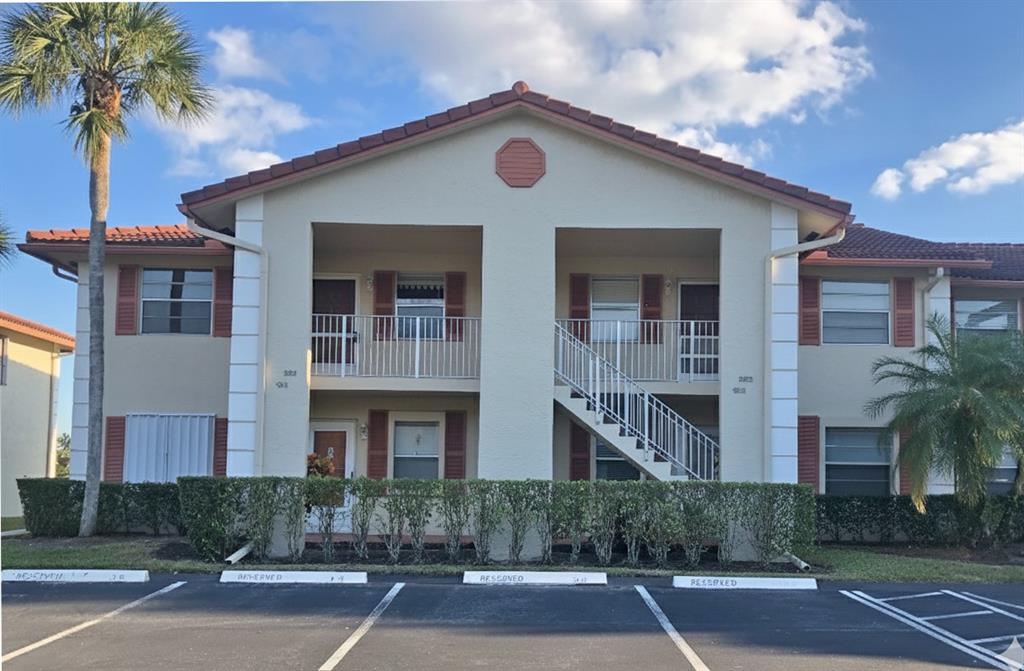 a front view of a house with yard