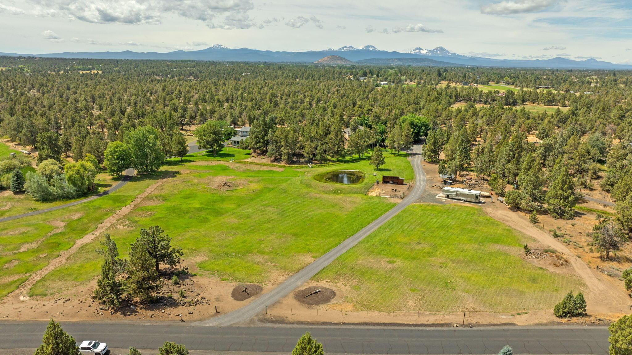62155 Cody Road Bend, OR 97701 - Photo 58 of 61 a view of a swimming pool with a lake view
