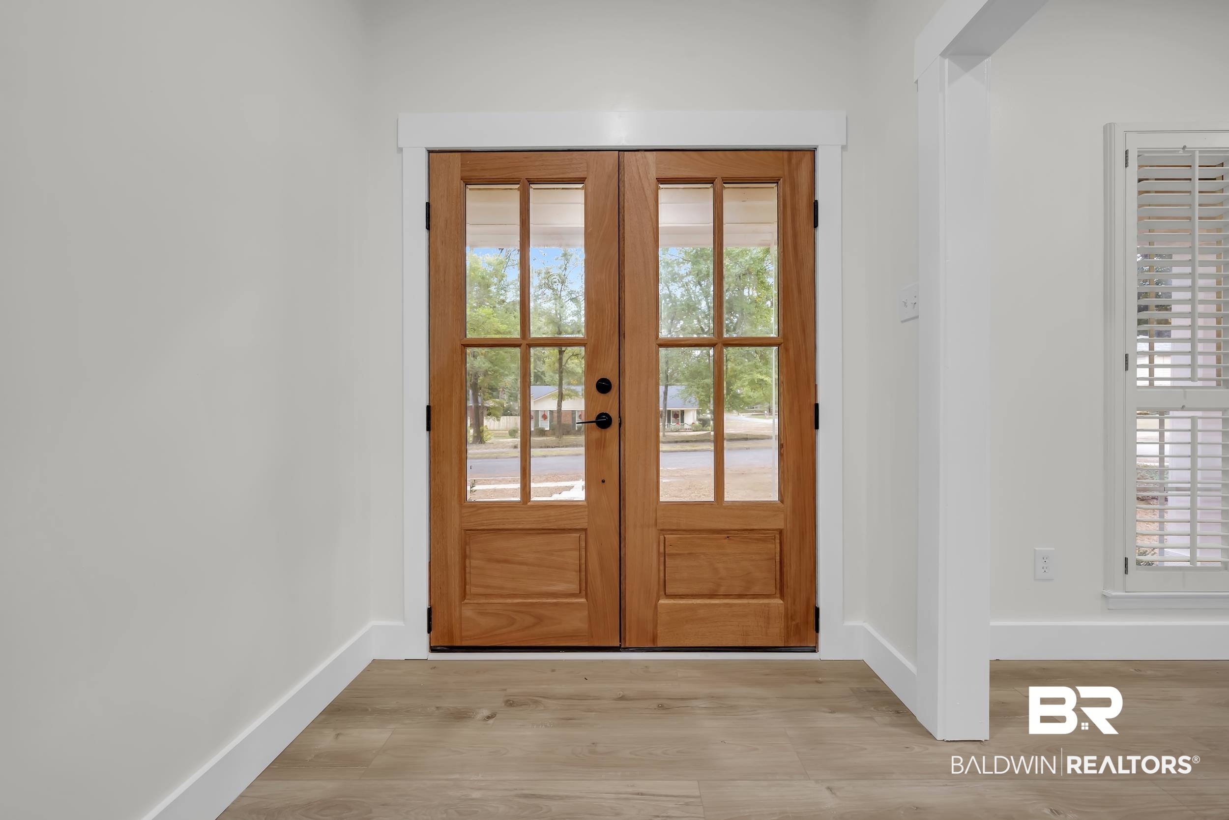 4924 Brooke Court Mobile, AL 36618 - Photo 4 of 34 Doorway with french doors and wood finished floors