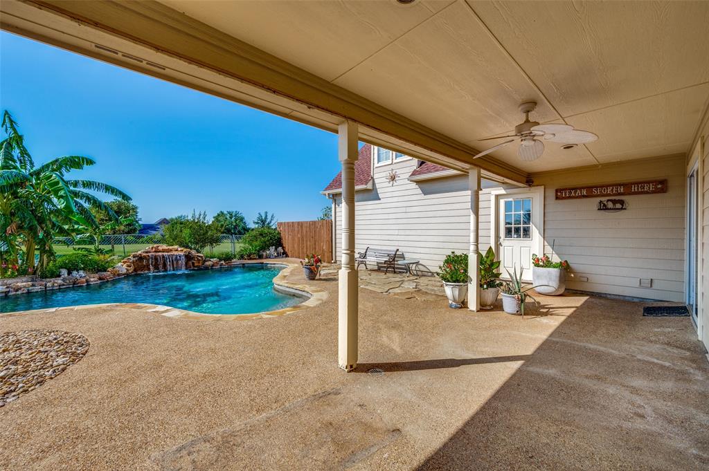 7889 County Road 134 Celina, TX 75009 - Photo 11 of 36 a view of a house with a patio