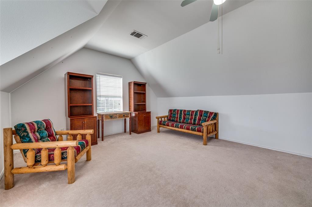 7889 County Road 134 Celina, TX 75009 - Photo 12 of 36 a living room with furniture and a window
