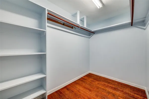 a bathroom with a sink a toilet and a shower