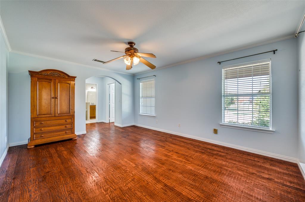 7889 County Road 134 Celina, TX 75009 - Photo 24 of 36 a view of empty room with wooden floor and fan