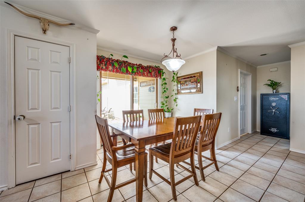 7889 County Road 134 Celina, TX 75009 - Photo 25 of 36 a view of a dining room with furniture