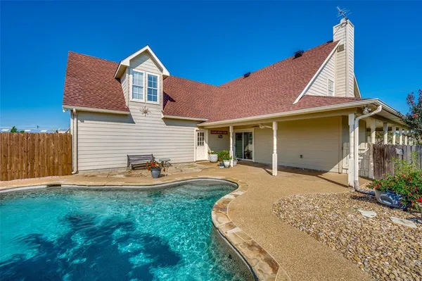 a view of a house with a patio