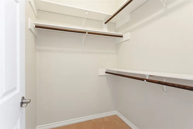 a view of a wooden deck and a yard