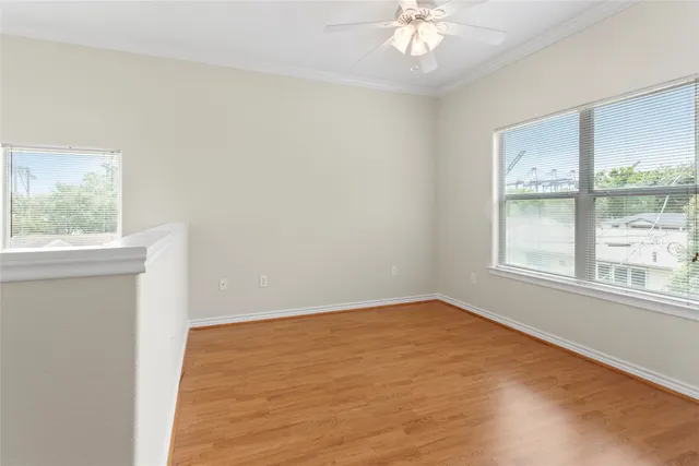 a bathroom with a granite countertop sink toilet a mirror and shower