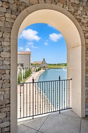 a view of a balcony with a swimming pool