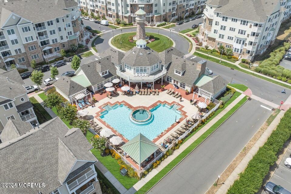 33 Cooper Avenue, Unit 210 Long Branch, NJ 07740 - Photo 12 of 12 a dining table with chairs and a table