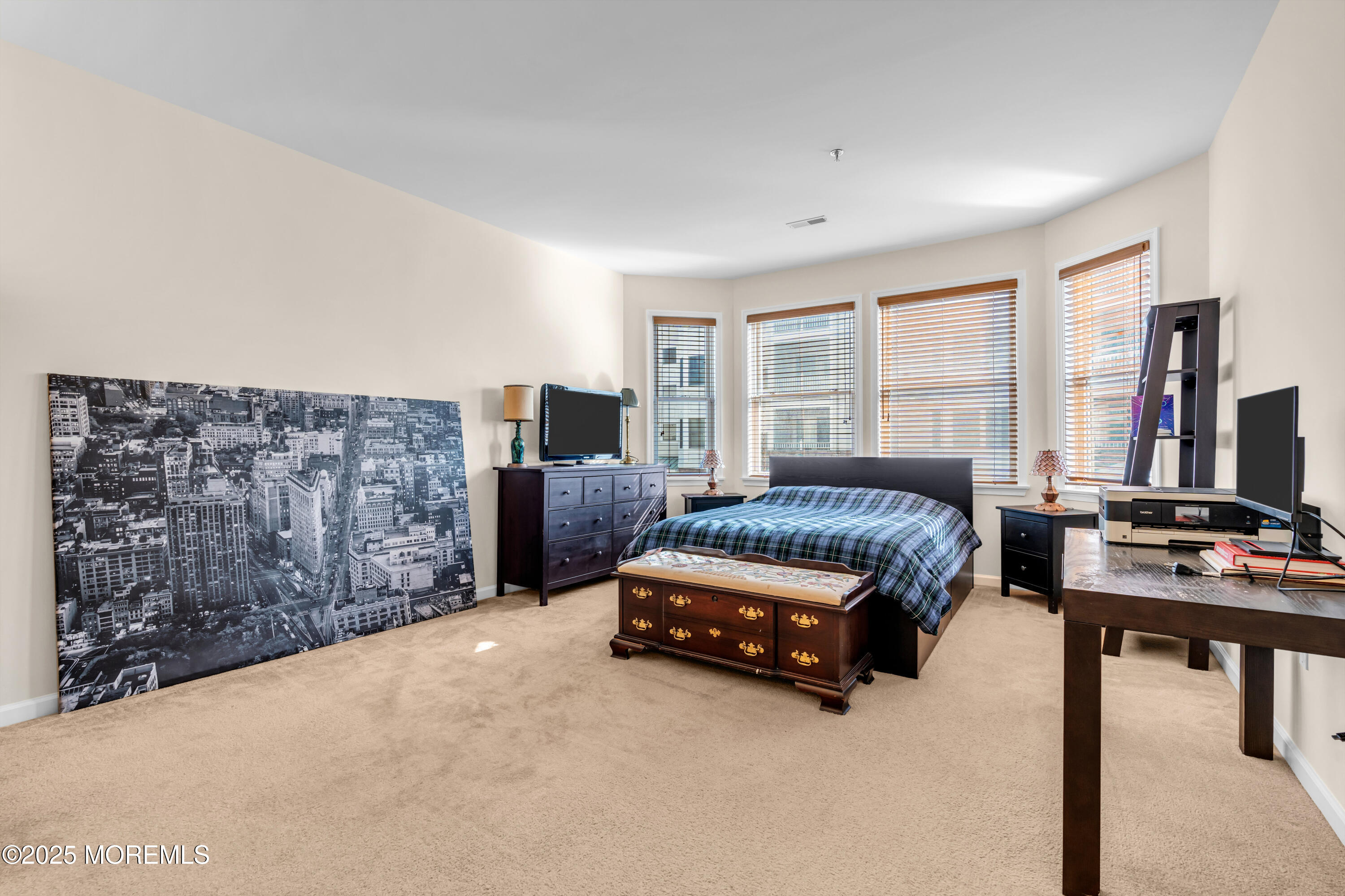 33 Cooper Avenue, Unit 210 Long Branch, NJ 07740 - Photo 6 of 12 a living room with furniture rug and window