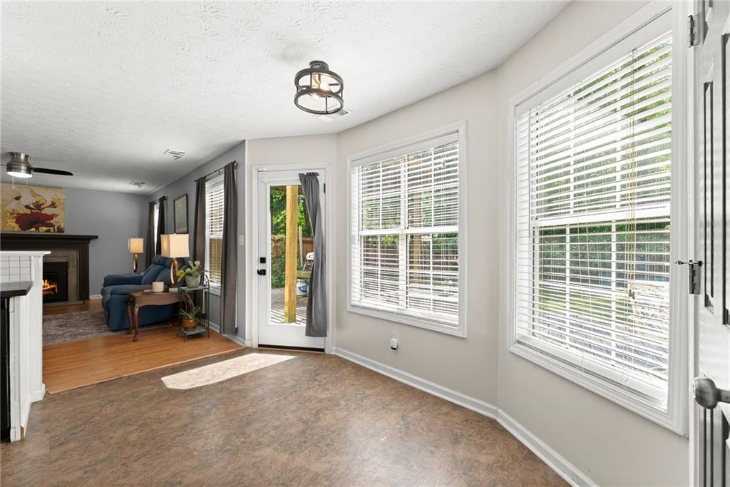 4055 Ivy Run Circle Duluth, GA 30096 - Photo 18 of 55 a view of a livingroom with furniture and a window