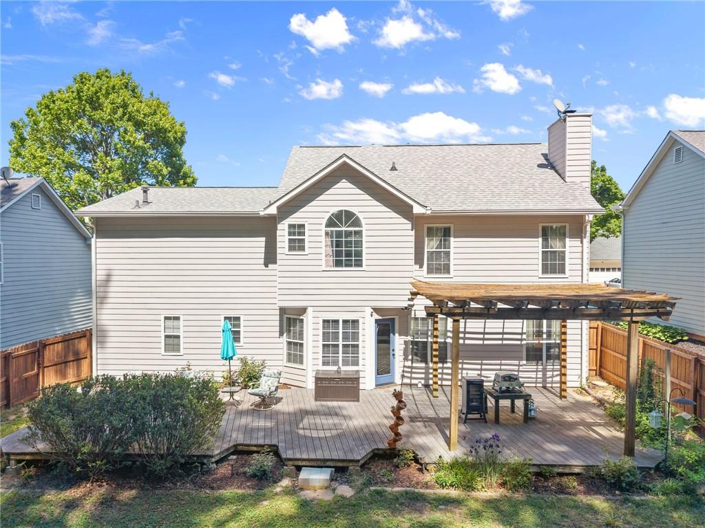 4055 Ivy Run Circle Duluth, GA 30096 - Photo 41 of 55 a backyard of a house with yard and outdoor seating