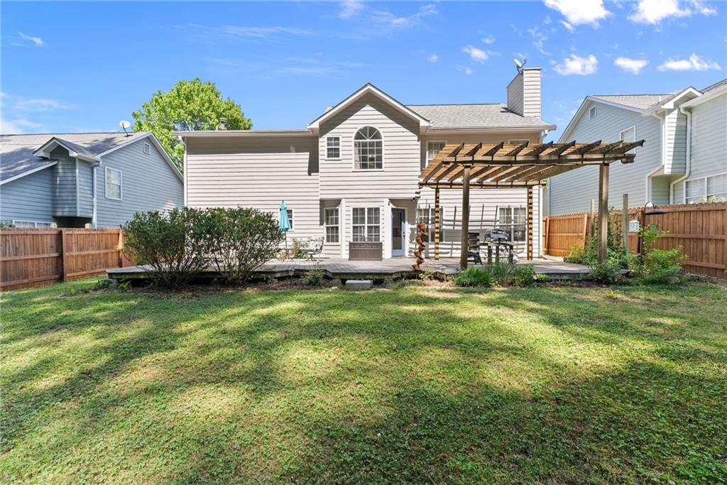 4055 Ivy Run Circle Duluth, GA 30096 - Photo 44 of 55 a front view of a house with a garden