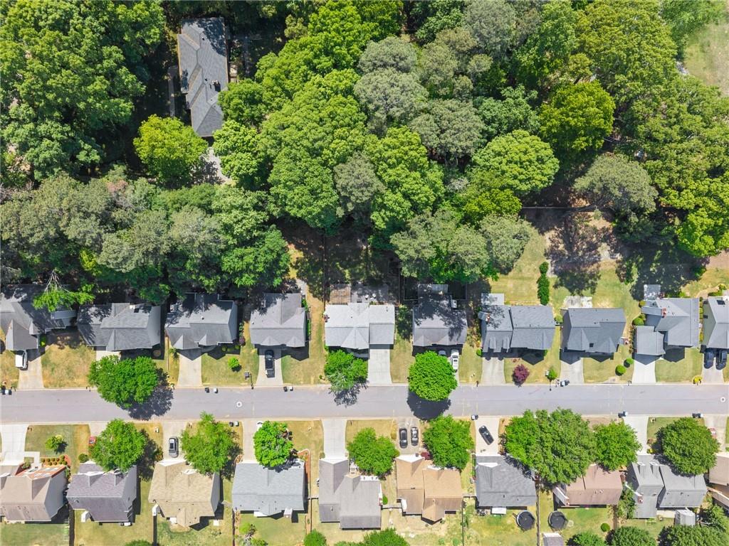 4055 Ivy Run Circle Duluth, GA 30096 - Photo 47 of 55 an aerial view of multiple houses with yard